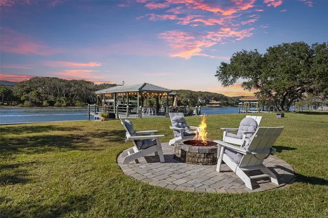 a utility room with sink dryer and washer