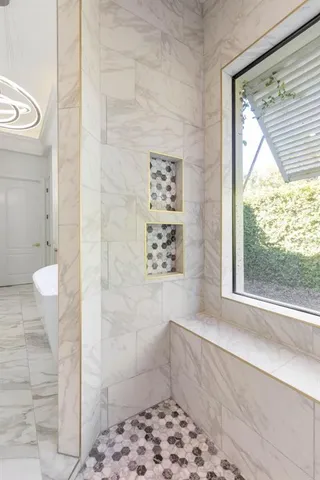 a view of a roof deck with table and chairs a barbeque with wooden floor and fence