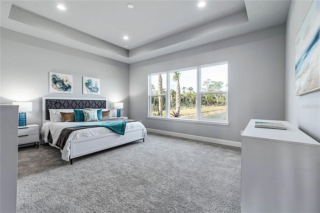 29 Coronado Road Flagler Beach, FL 32136 - Photo 22 of 81 a bedroom with a large bed and a window