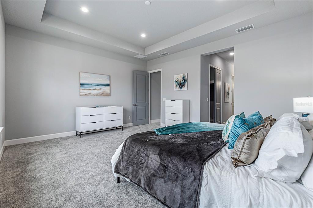 29 Coronado Road Flagler Beach, FL 32136 - Photo 24 of 81 a bedroom with a bed and a painting