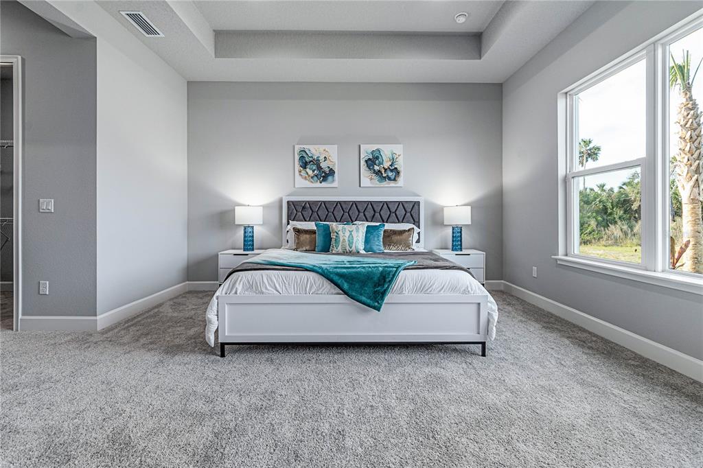 29 Coronado Road Flagler Beach, FL 32136 - Photo 26 of 81 a bedroom with a bed and a window