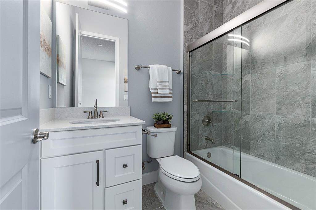 29 Coronado Road Flagler Beach, FL 32136 - Photo 33 of 81 a bathroom with a sink toilet and shower
