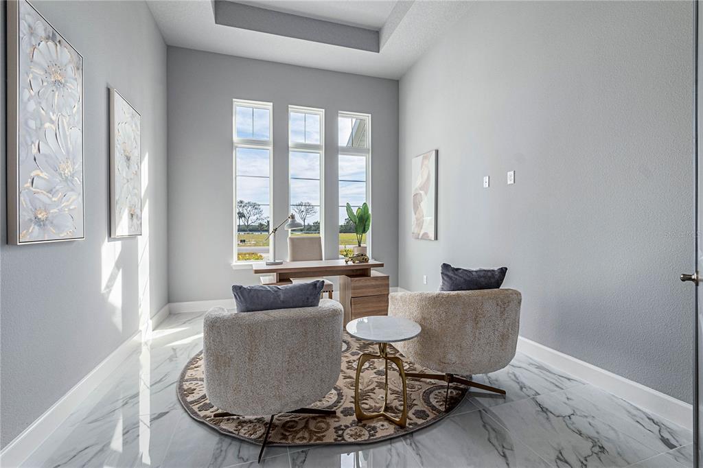 29 Coronado Road Flagler Beach, FL 32136 - Photo 41 of 81 a living room with furniture and a large window