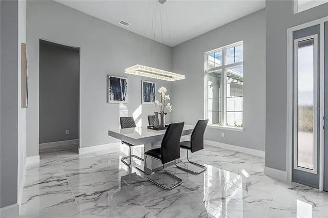a view of a dining room with furniture