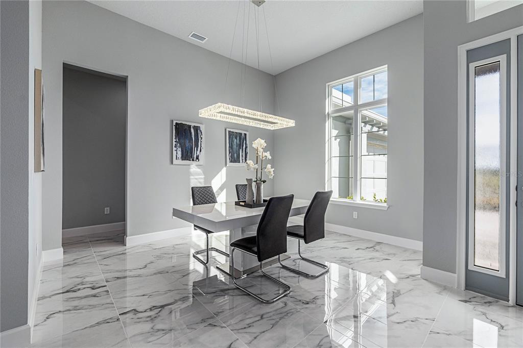 29 Coronado Road Flagler Beach, FL 32136 - Photo 6 of 81 a dining room with furniture and window