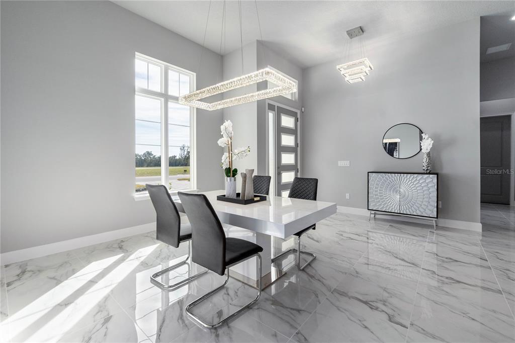 29 Coronado Road Flagler Beach, FL 32136 - Photo 7 of 81 a view of a dining room with furniture window and outside view