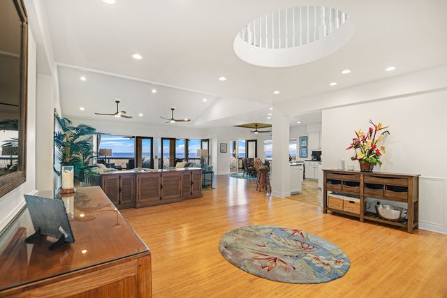a living room with furniture and a table