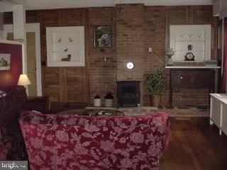 8513 Newark Road Newark, MD 21841 - Photo 13 of 14 a room with a fireplace