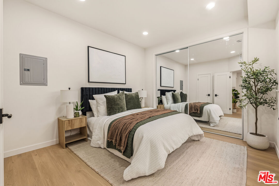 311 Bora Bora Way, Unit 3207 Marina del Rey, CA 90292 - Photo 31 of 54 a spacious bedroom with a bed and a couch