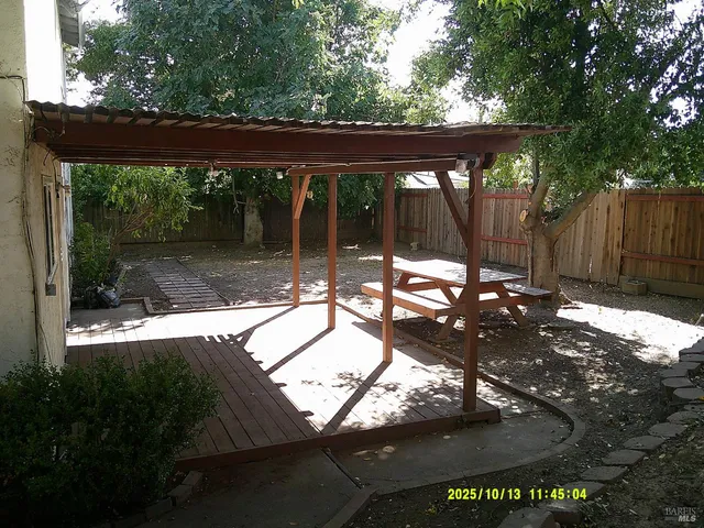 a view of backyard with green space