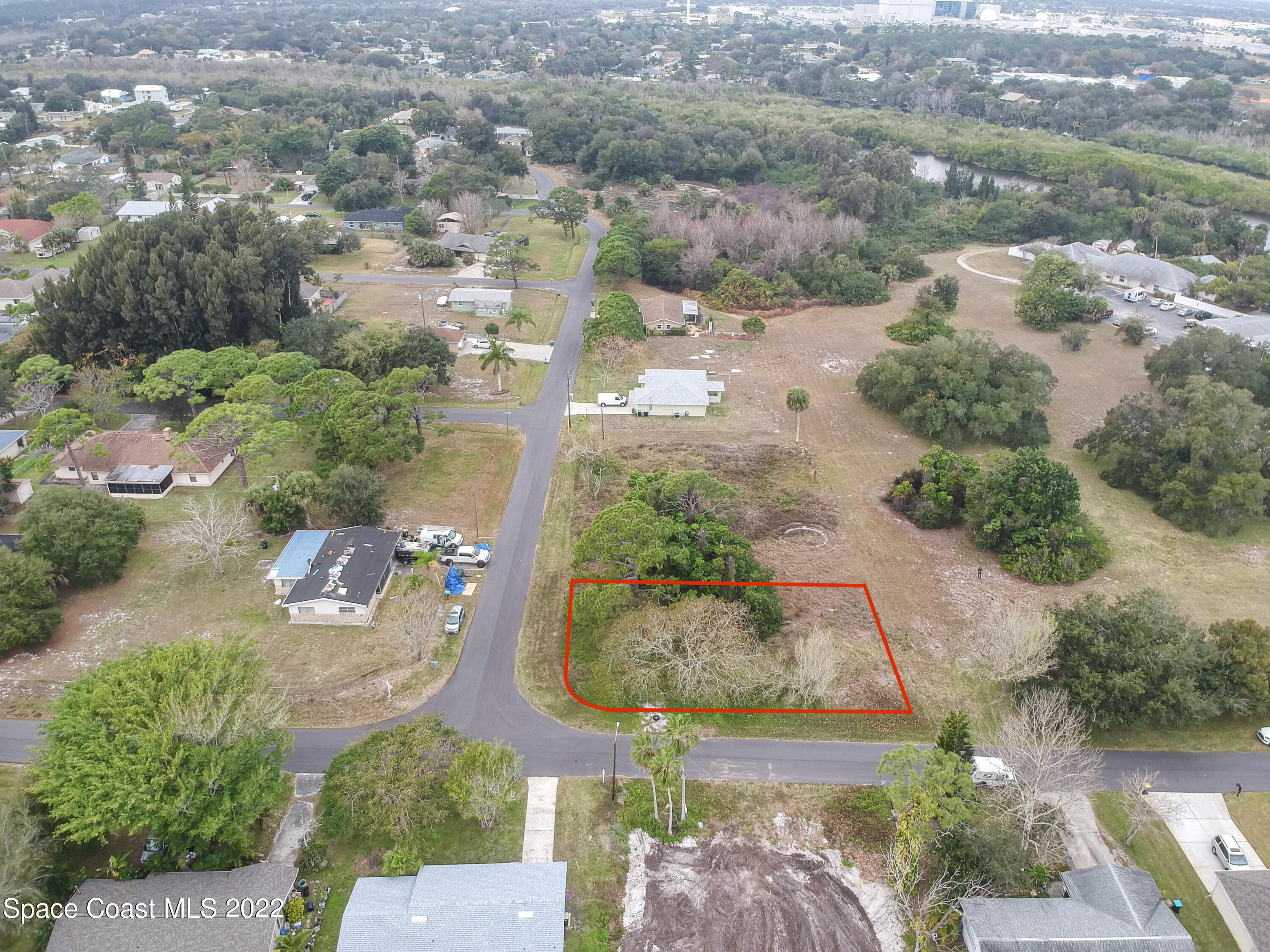 1198 Ver Circle Northeast Palm Bay, FL 32905 - Photo 5 of 7 an aerial view of residential houses with outdoor space