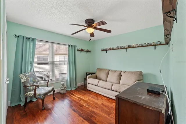 a living room with furniture and a window