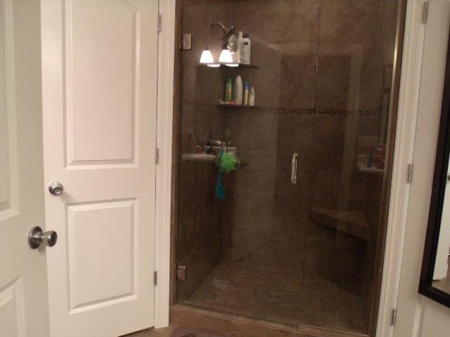 2190 Lynchburg Road Winchester, TN 37398 - Photo 10 of 17 a bathroom with a glass shower door