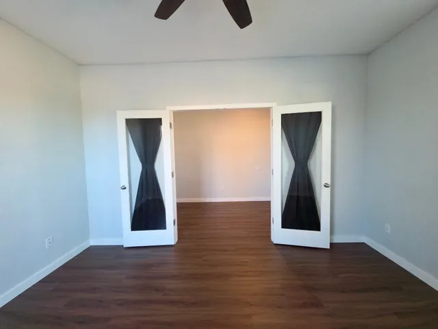 a view of entryway with wooden floor