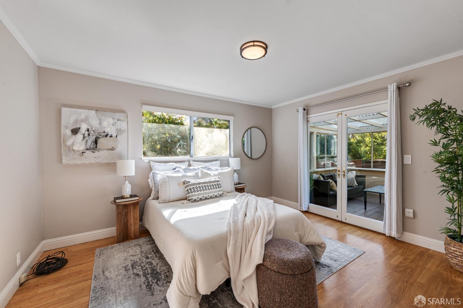 1284 Columbus Street El Granada, CA 94019 - Photo 11 of 15 a living room with furniture large window and wooden floor