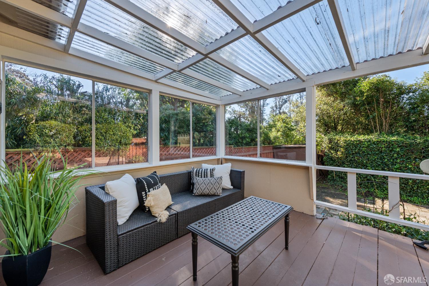 1284 Columbus Street El Granada, CA 94019 - Photo 15 of 15 a outdoor living space with furniture and garden view