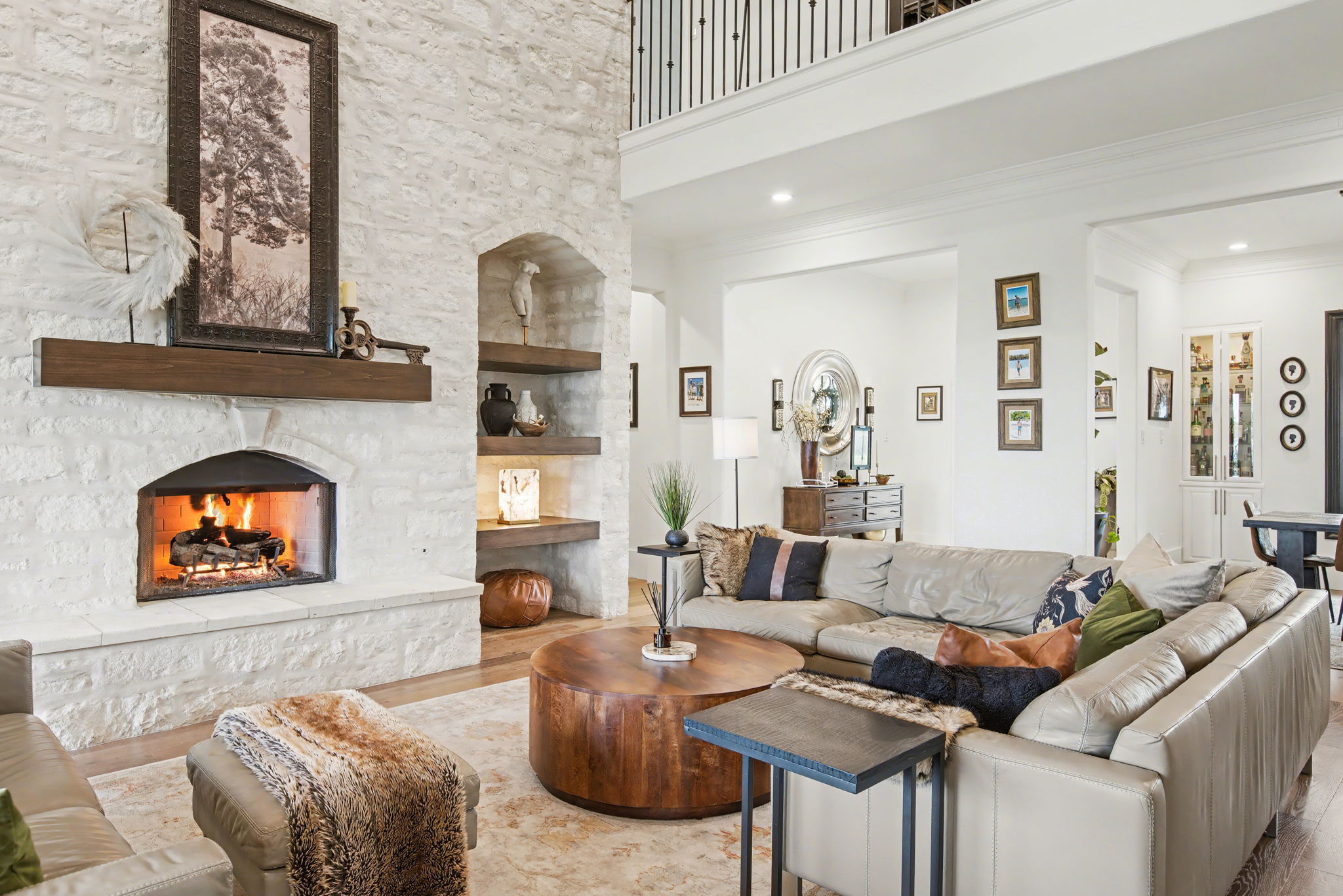 447 Winning Colors Austin, TX 78737 - Photo 5 of 40 Stunning and Spacious Living Room -- vaulted | beamed ceilings and beautiful white oak flooring throughout much of the first floor