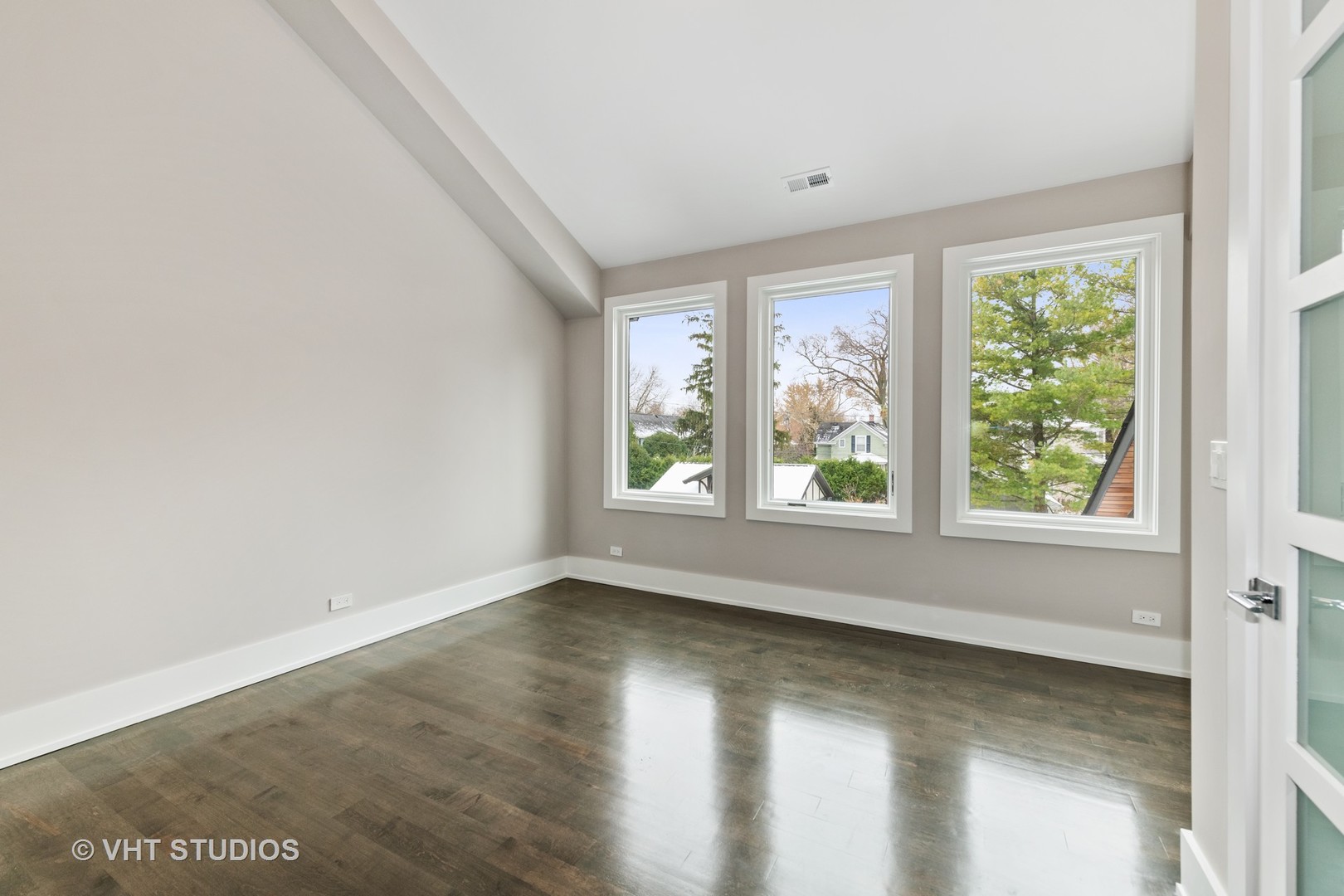 558 Willow Road Winnetka, IL 60093 - Photo 30 of 43 a view of an empty room with a window