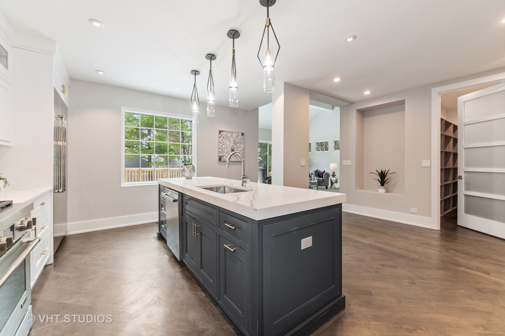558 Willow Road Winnetka, IL 60093 - Photo 5 of 43 a kitchen with a stove and a sink