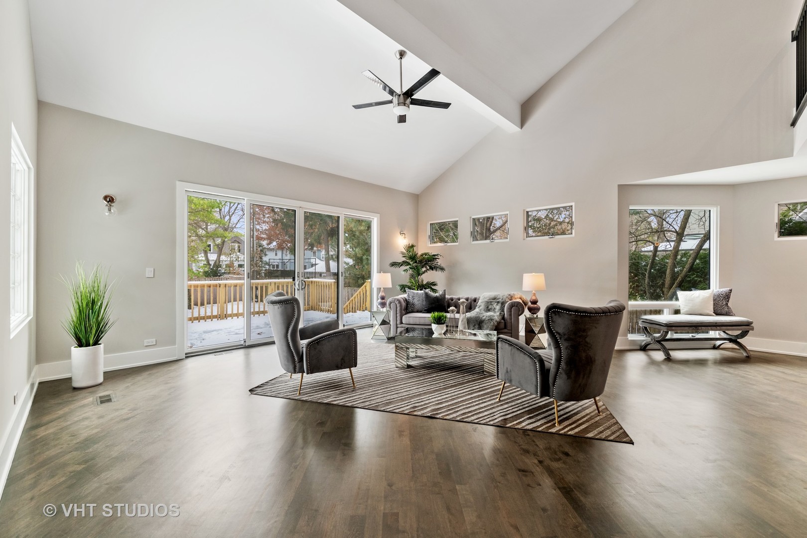 558 Willow Road Winnetka, IL 60093 - Photo 10 of 43 a living room with furniture and a large window