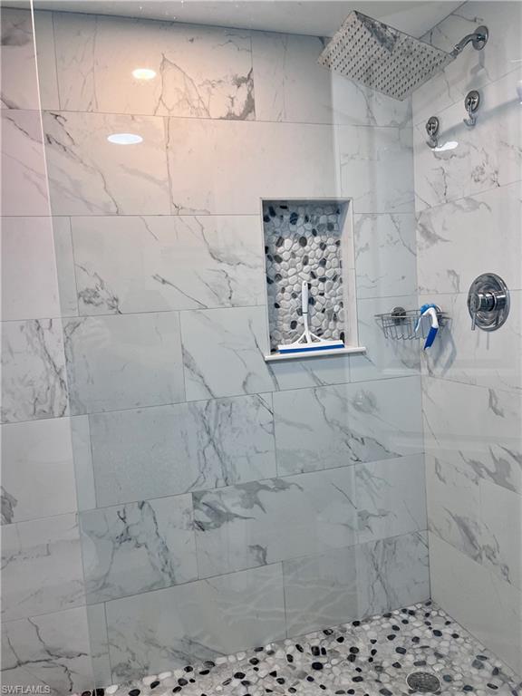 202 Peppermint Lane, Unit 2 Naples, FL 34112 - Photo 11 of 23 a bathroom with a shower