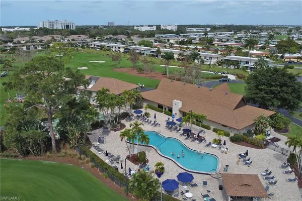 an aerial view of a house with a garden