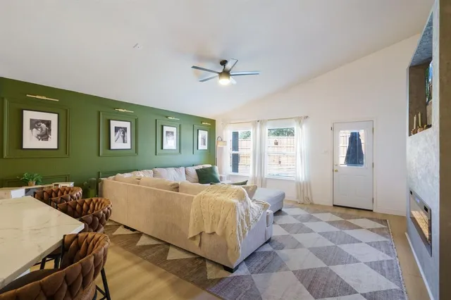 a bed room with a bed and a television