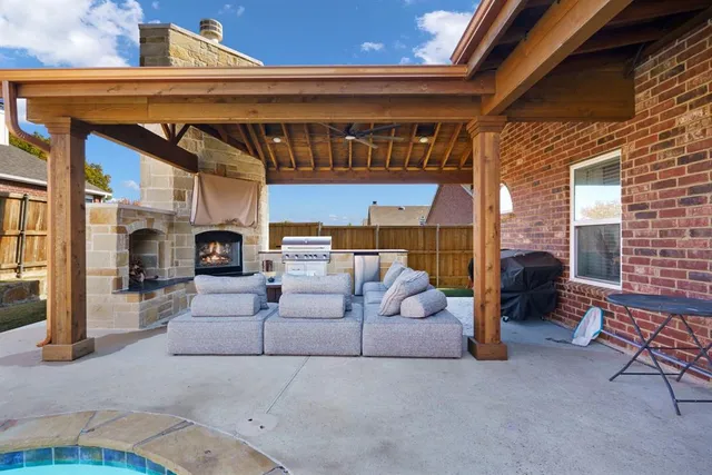 a bedroom with a bed and a mirror on dresser