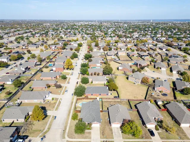 a view of a swimming pool with a lounge chairs