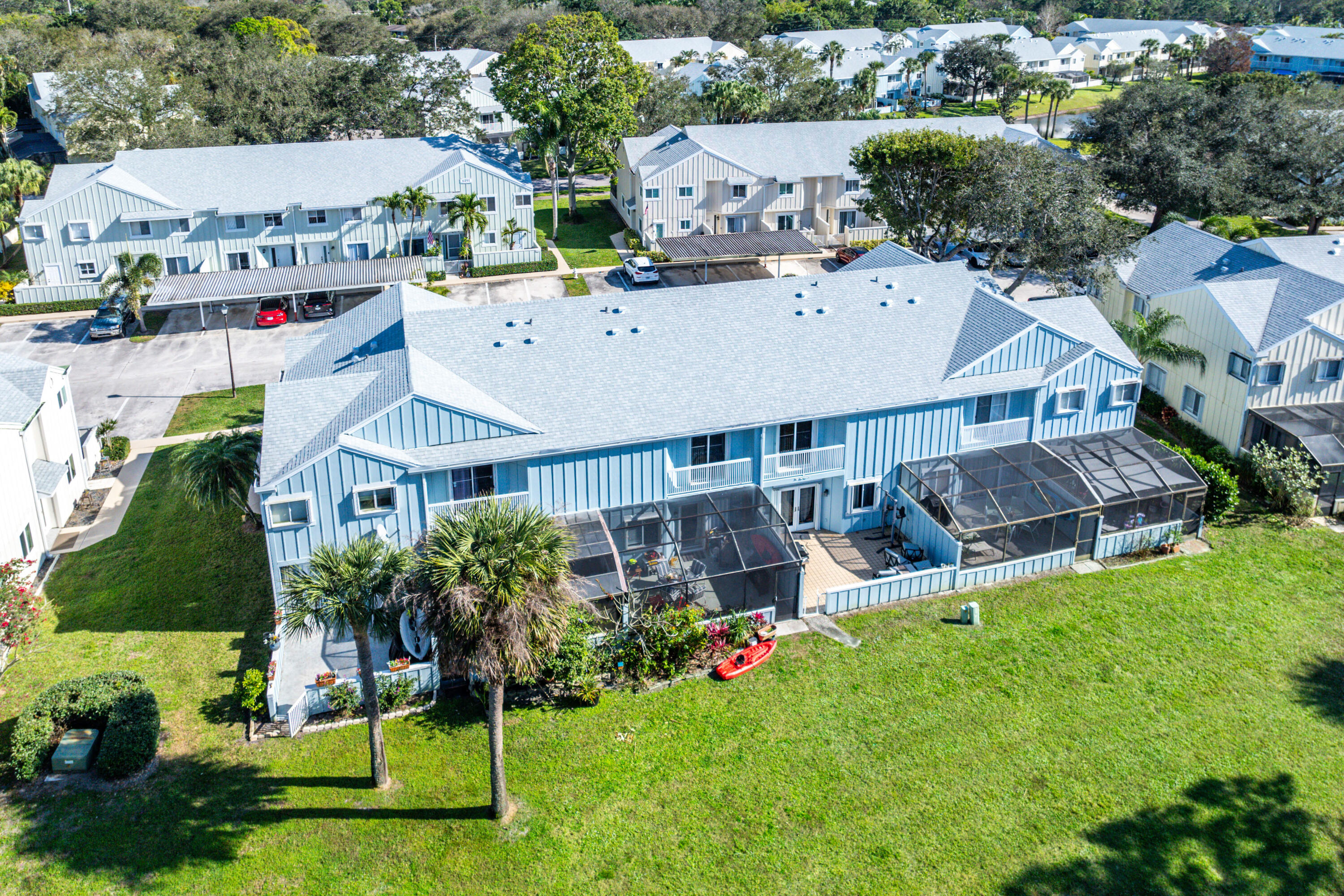 6199 Riverwalk Lane, Unit 6 Jupiter, FL 33458 - Photo 27 of 33 an aerial view of a house with a garden