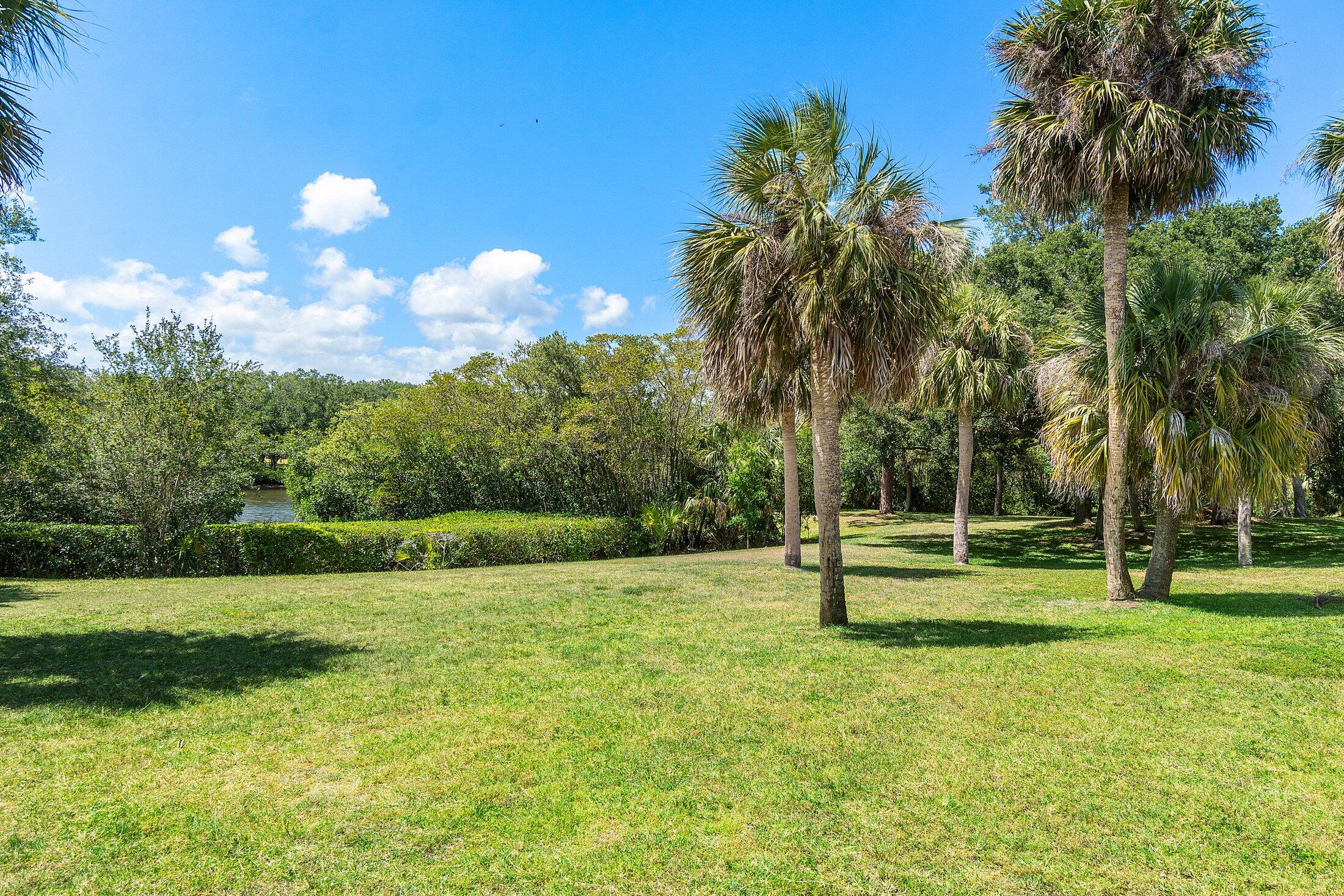 6199 Riverwalk Lane, Unit 6 Jupiter, FL 33458 - Photo 33 of 33 a view of a park with swings and slides