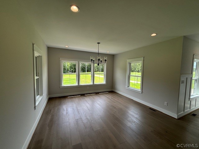 6030 Studley Road Mechanicsville, VA 23116 - Photo 5 of 14 an empty room with wooden floor and windows