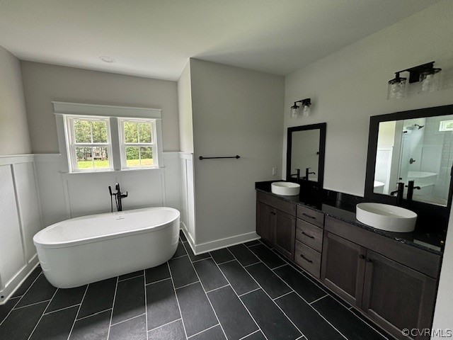 6030 Studley Road Mechanicsville, VA 23116 - Photo 10 of 14 a bathroom with a sink and a mirror