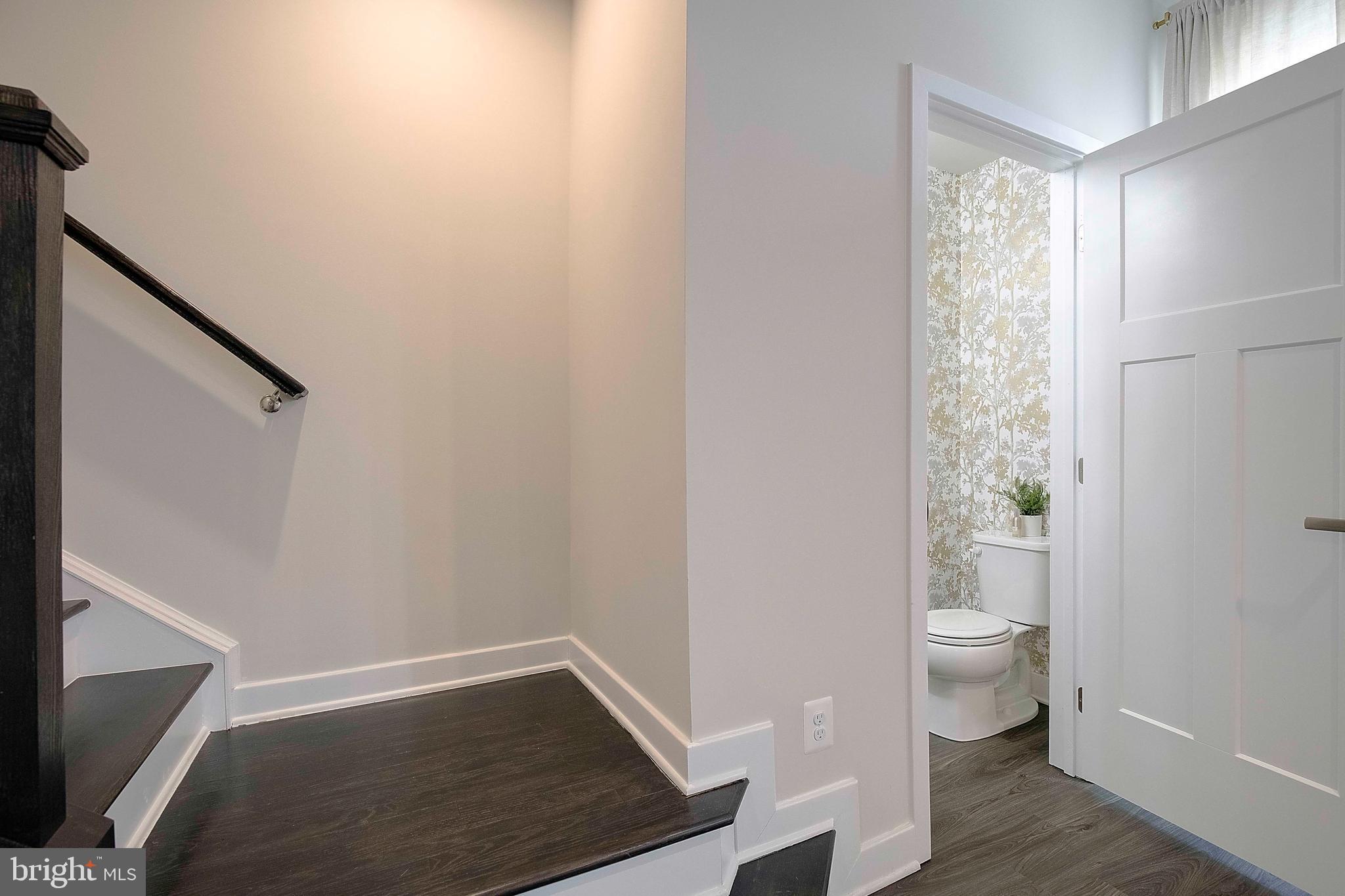 121 Swanson Creek Terrace Laurel, MD 20708 - Photo 10 of 31 a view of bathroom with a toilet a sink and a window