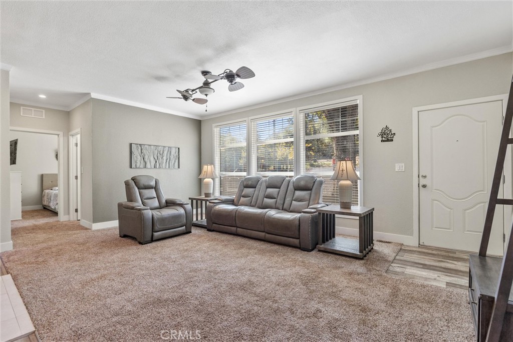 12656 Centerville Road Chico, CA 95928 - Photo 10 of 46 a living room with furniture and a large window