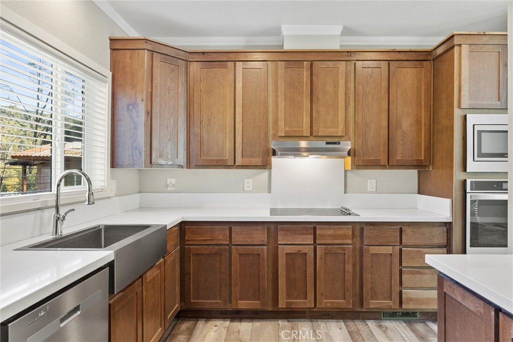 12656 Centerville Road Chico, CA 95928 - Photo 11 of 46 a kitchen with a sink cabinets and window