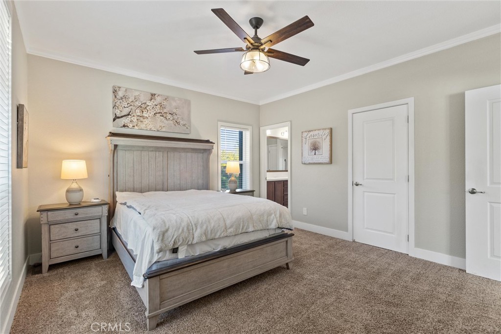 12656 Centerville Road Chico, CA 95928 - Photo 19 of 46 a bedroom with a bed and a window