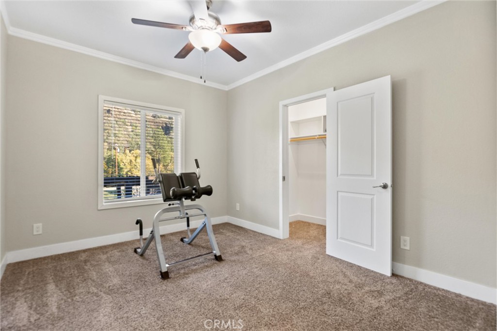 12656 Centerville Road Chico, CA 95928 - Photo 23 of 46 a living room with furniture and windows