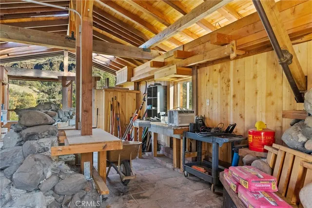 a view of front door and deck of the house