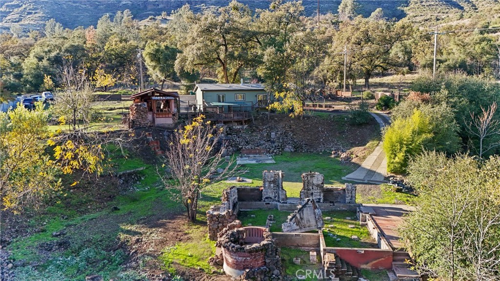 12656 Centerville Road Chico, CA 95928 - Photo 32 of 46 a view of a house with a yard and sitting area