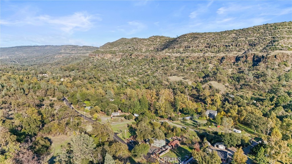 12656 Centerville Road Chico, CA 95928 - Photo 43 of 46 a view of a large building with mountains in the background
