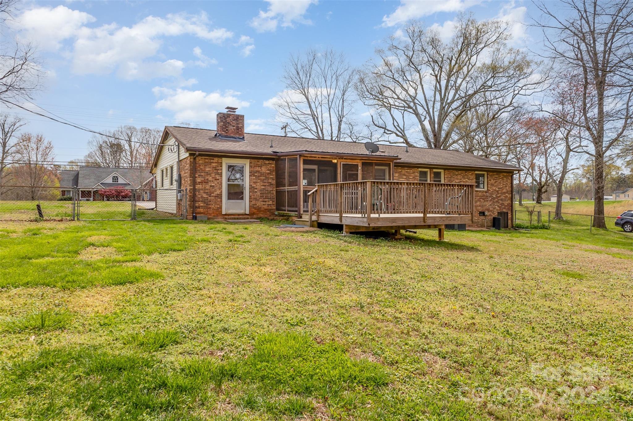 4007 Beaty Road Gastonia, NC 28056 - Photo 16 of 24 a view of a house with a yard and sitting area
