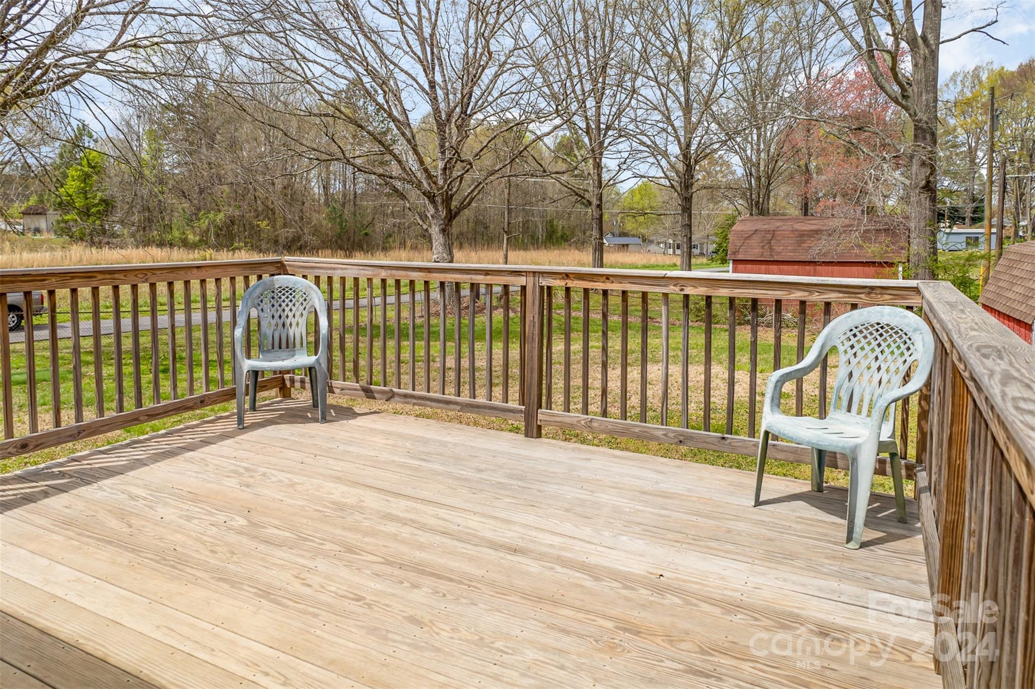 4007 Beaty Road Gastonia, NC 28056 - Photo 17 of 24 a view of a chair and tables on the wooden floor