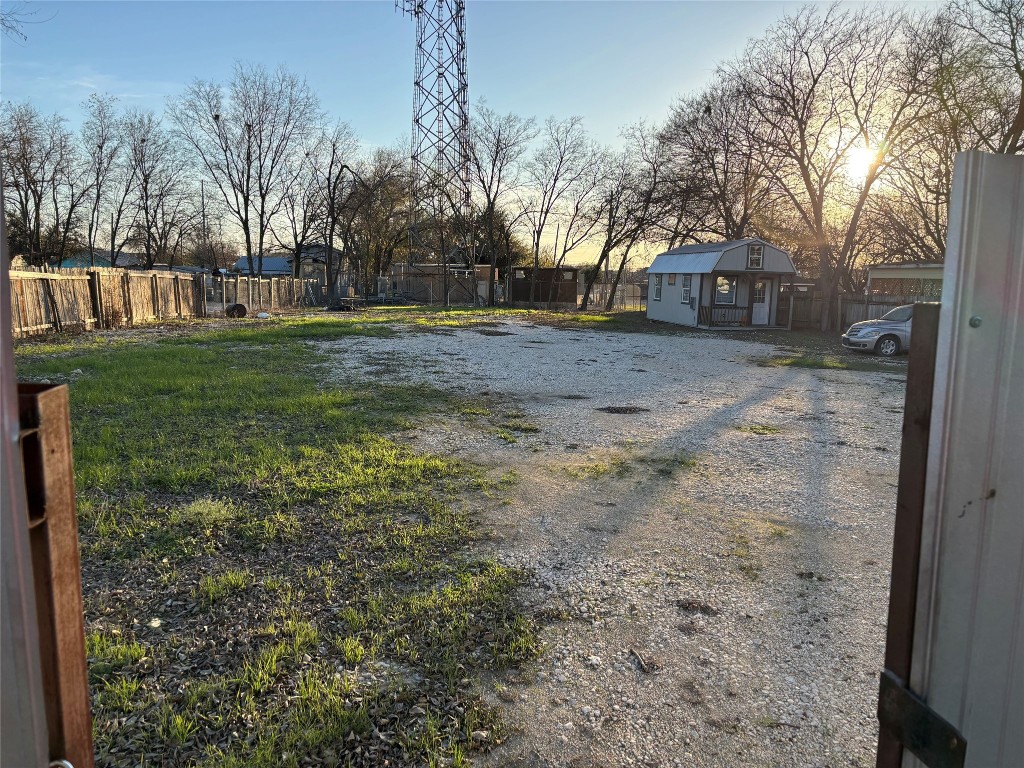 2505 Daisy Drive Austin, TX 78727 - Photo 3 of 8 a view of a yard with a house