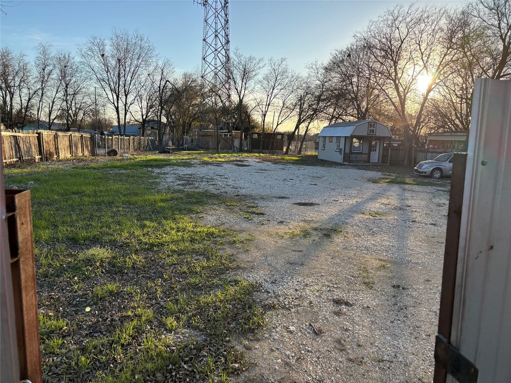 2505 Daisy Drive Austin, TX 78727 - Photo 4 of 8 a view of a yard with a house