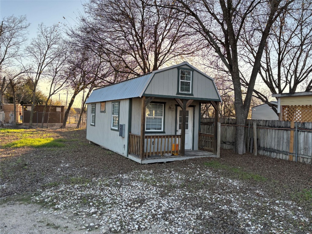 2505 Daisy Drive Austin, TX 78727 - Photo 6 of 8 a front view of a house with garden