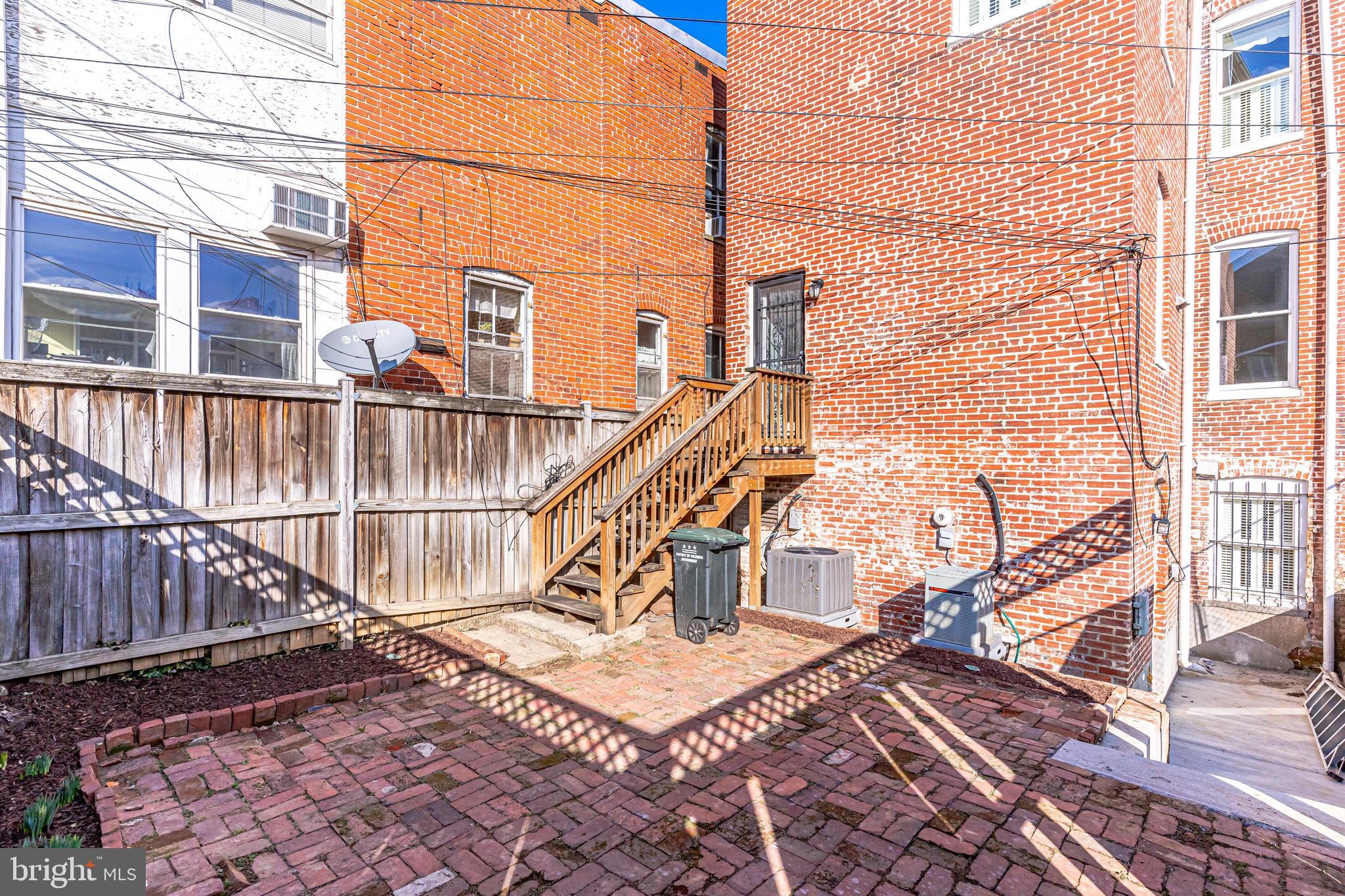 333 5th Street Southeast Washington, DC 20003 - Photo 45 of 58 Patio w/planting beds. Daffodils are coming up