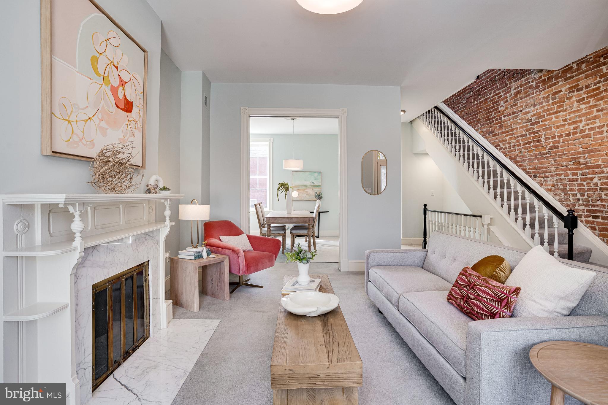 333 5th Street Southeast Washington, DC 20003 - Photo 9 of 58 Bright open main level. Pocket doors between LR/DR