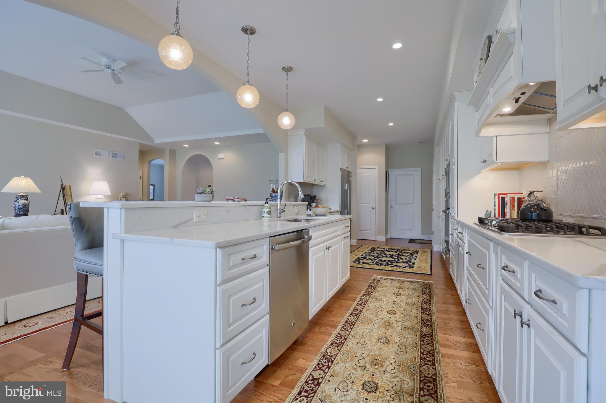 653 Dorset Street Lititz, PA 17543 - Photo 9 of 30 a large kitchen with kitchen island a sink stainless steel appliances and cabinets