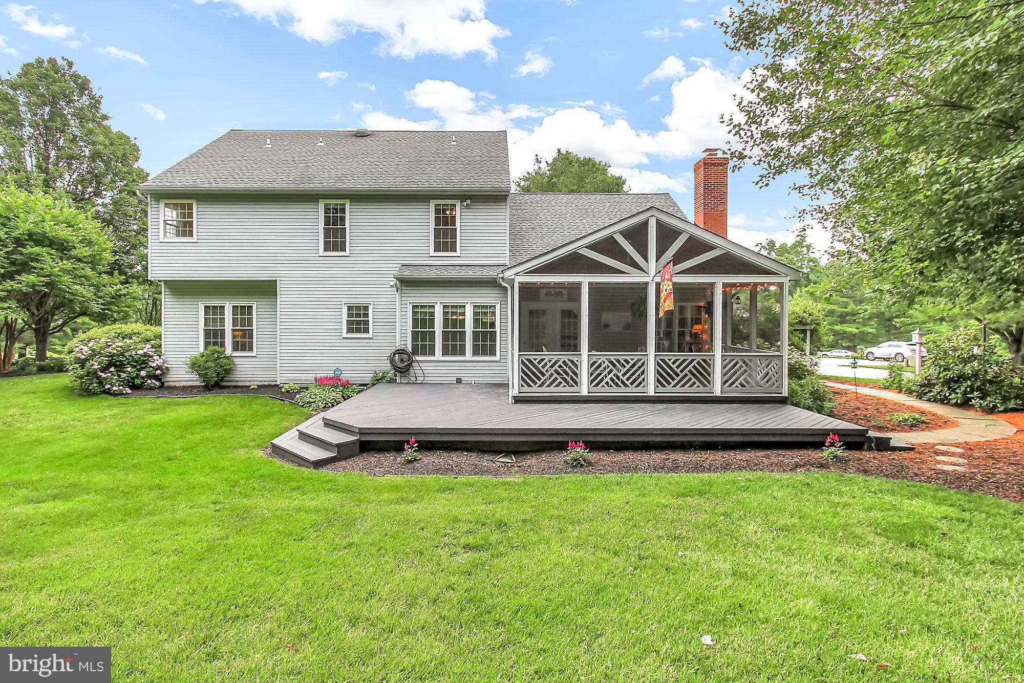 6 Farm Ridge Court Baldwin, MD 21013 - Photo 30 of 39 Deck surrounds screened porch...